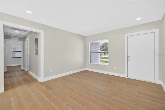 a kitchen with a sink stove and microwave