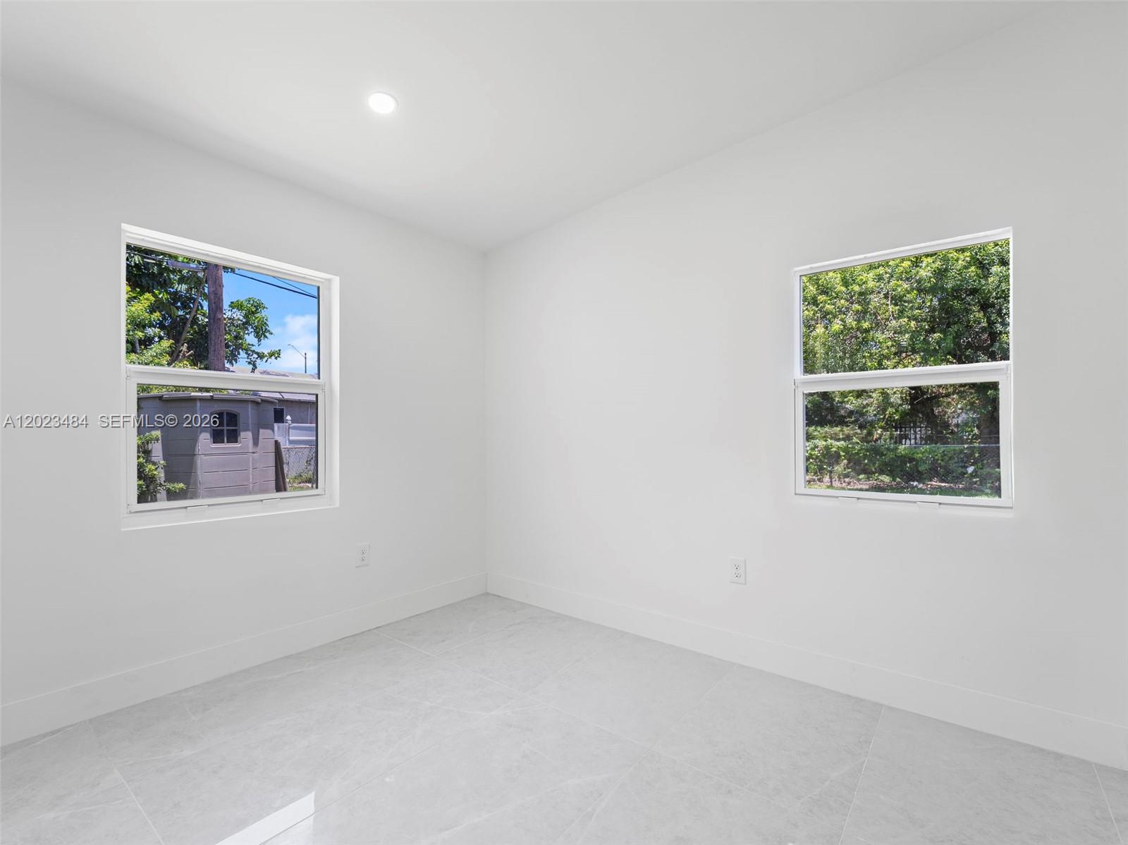 1961 Rutland Street Opa-Locka, FL 33054 - Photo 10 of 33 an empty room with a window