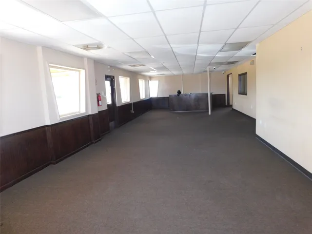 a view of empty room with windows