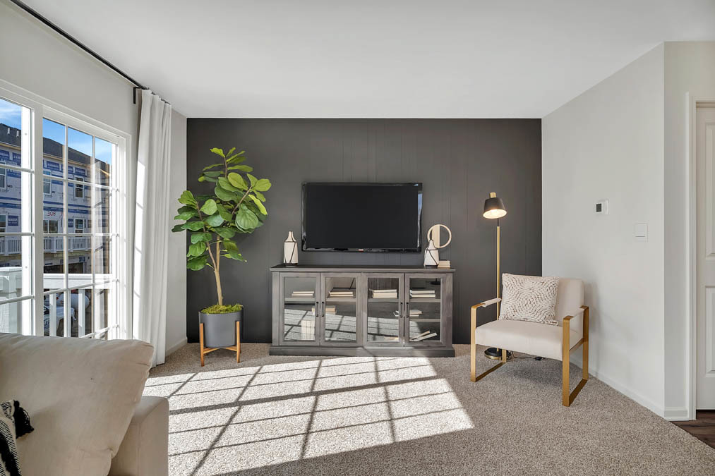 369 Bridgeview Court St. Charles, IL 60174 - Photo 25 of 44 a living room with furniture and a flat screen tv