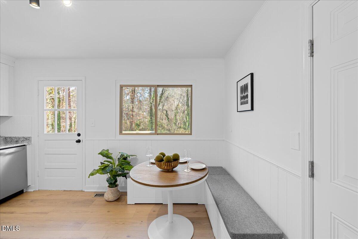 1406 Valley Road Garner, NC 27529 - Photo 15 of 39 a view of a workspace with furniture and window