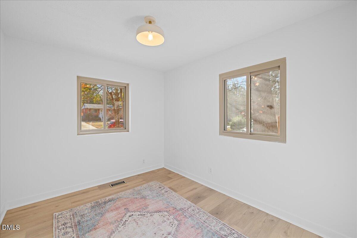 1406 Valley Road Garner, NC 27529 - Photo 23 of 39 a view of empty room with window
