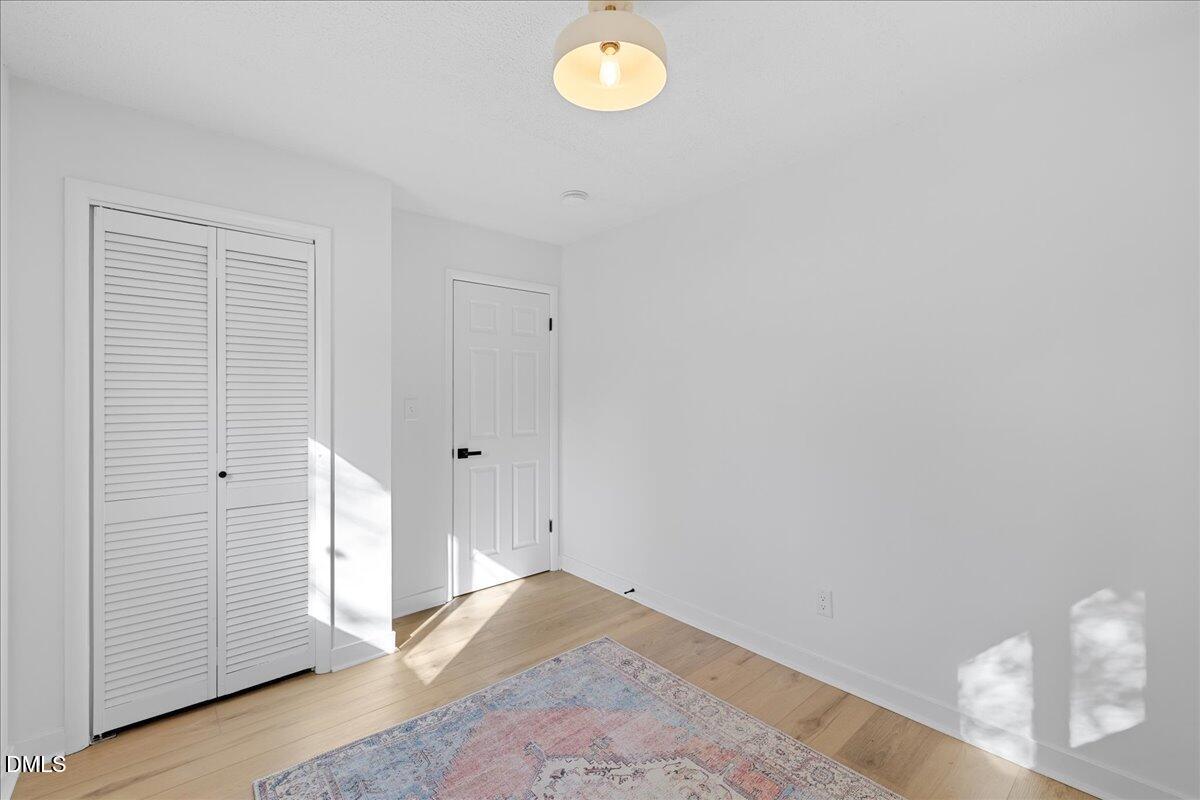 1406 Valley Road Garner, NC 27529 - Photo 24 of 39 a view of empty room with window