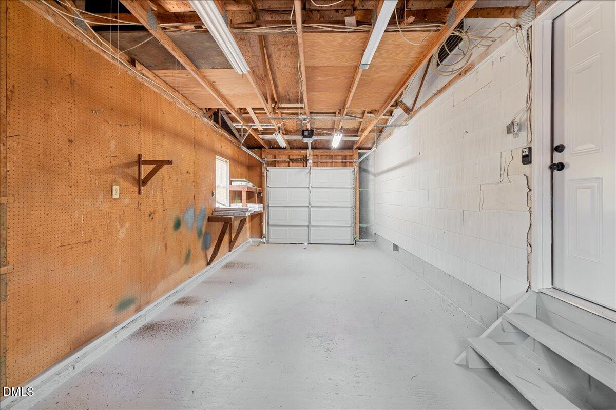 1406 Valley Road Garner, NC 27529 - Photo 25 of 39 a view of a garage