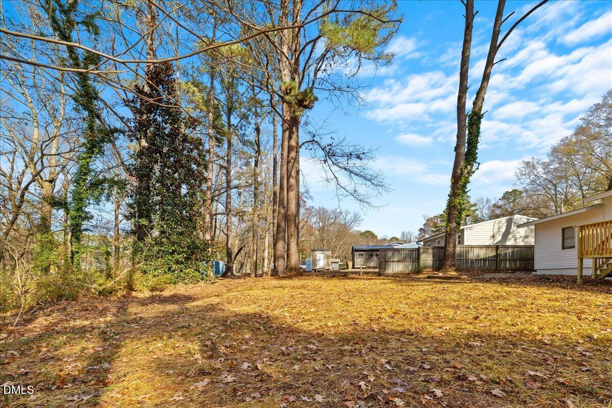 1406 Valley Road Garner, NC 27529 - Photo 34 of 39 a view of large yard with green space