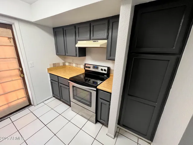 a view of kitchen with a stove