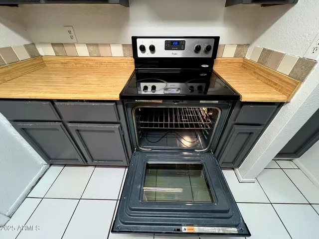 a view of room with window and hardwood floor