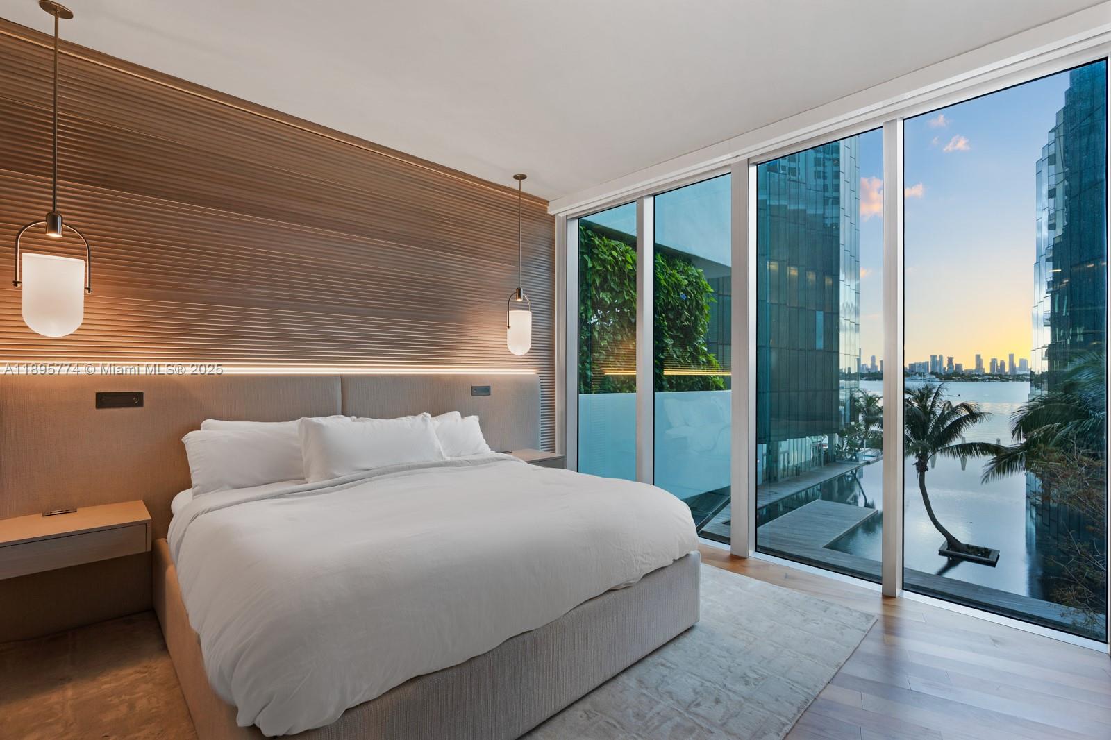 1300 Monad Terrace, Unit 3B Miami Beach, FL 33139 - Photo 15 of 35 a bedroom with a bed and a floor to ceiling window