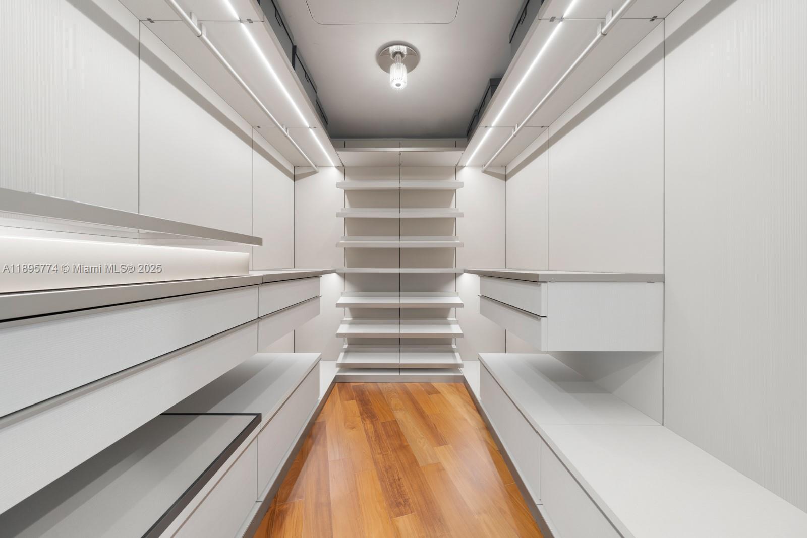 1300 Monad Terrace, Unit 3B Miami Beach, FL 33139 - Photo 21 of 35 a view of walk in closet with empty racks