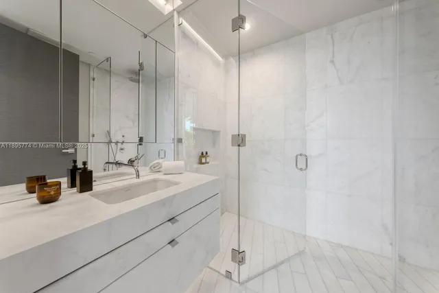 a living room with furniture tv and a large window