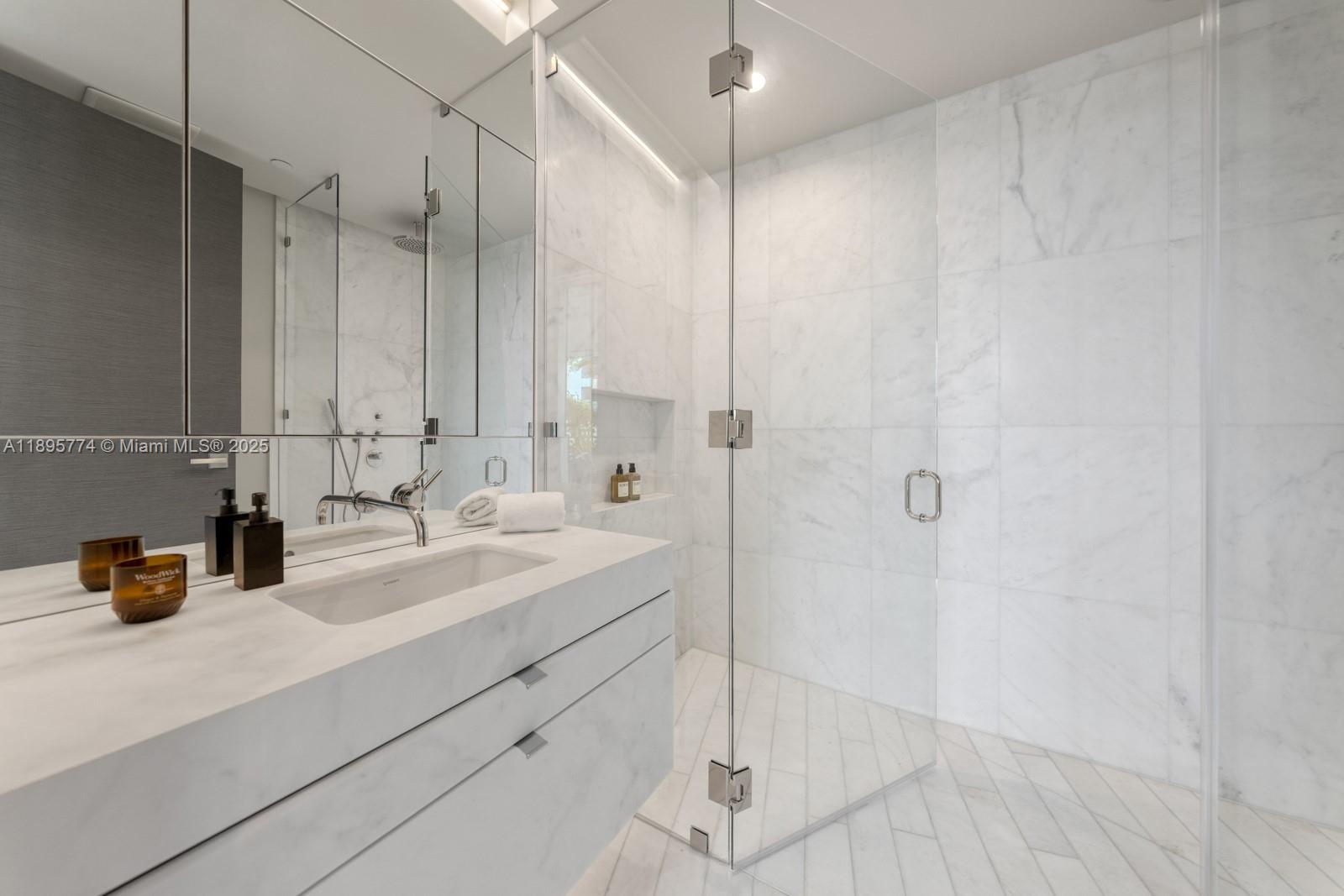 1300 Monad Terrace, Unit 3B Miami Beach, FL 33139 - Photo 27 of 35 a bathroom with a sink double vanity and shower
