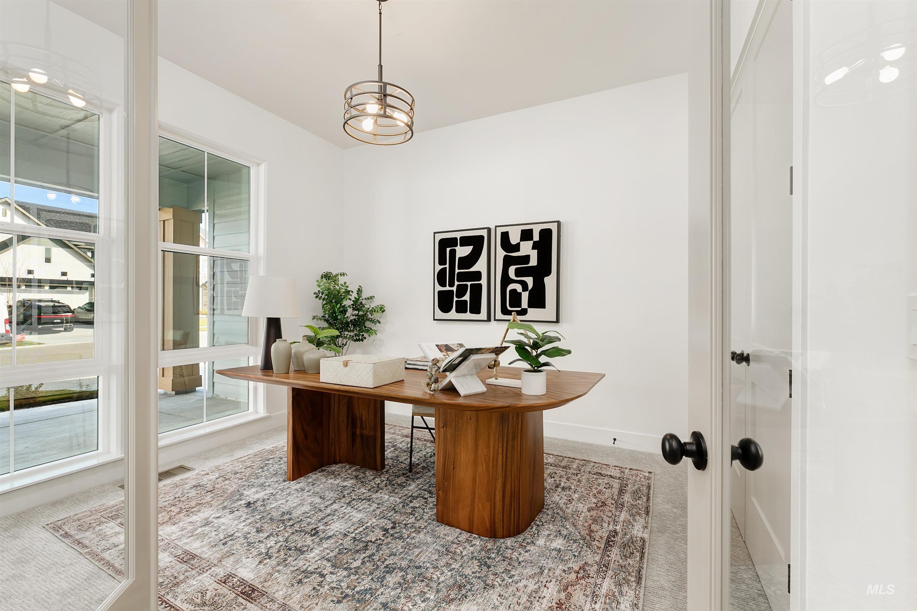 13623 North Ruffed Grouse Way Boise, ID 83714 - Photo 17 of 45 Carpeted home office featuring baseboards