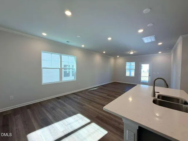 a view of kitchen and sink