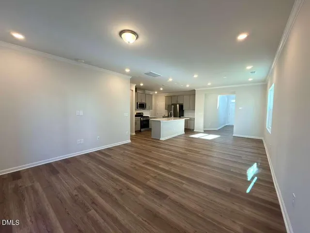 a view of a kitchen with a sink and a stove