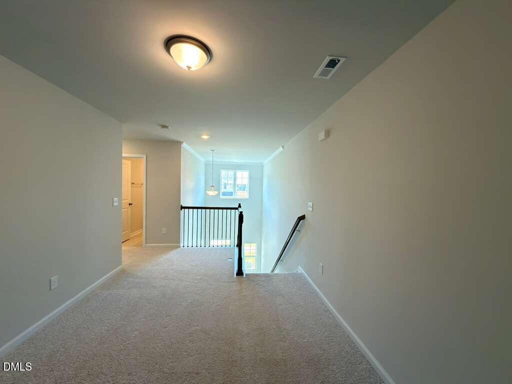 2008 English Saddle Lane Durham, NC 27703 - Photo 25 of 49 a view of empty room with wooden floor