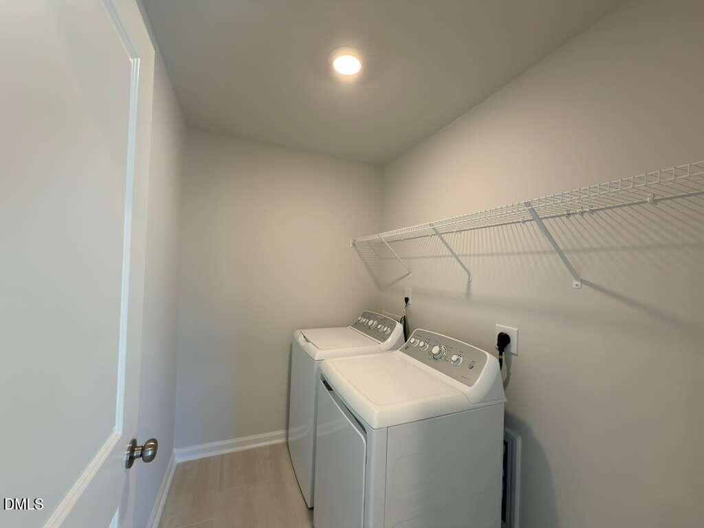 2008 English Saddle Lane Durham, NC 27703 - Photo 28 of 49 a utility room with dryer and washer