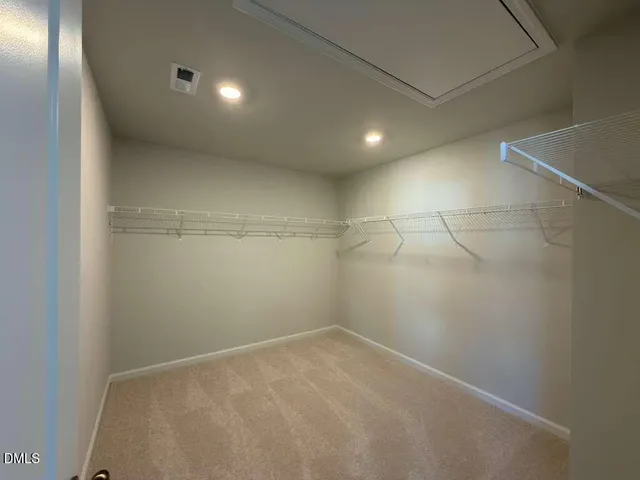 a view of a room with racks on the wall