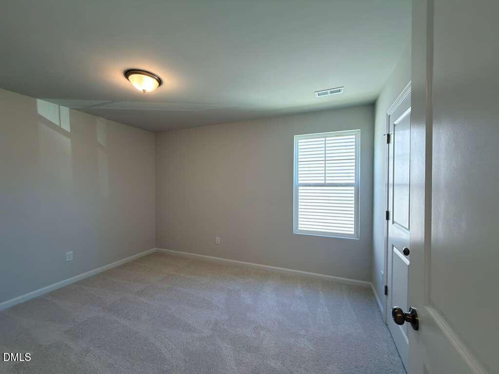 2008 English Saddle Lane Durham, NC 27703 - Photo 34 of 49 an empty room with a window