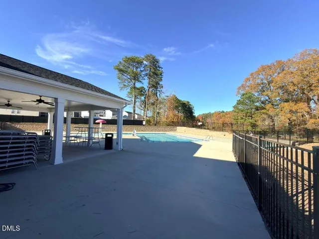 a view of an chairs and tables in the patio