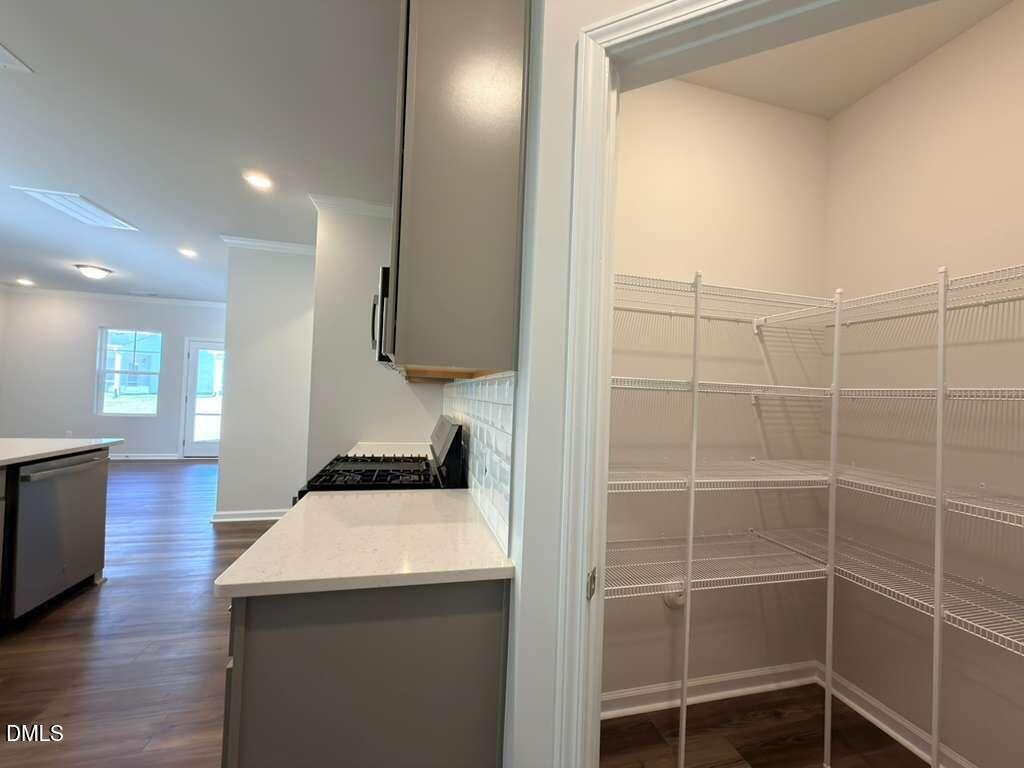 2008 English Saddle Lane Durham, NC 27703 - Photo 10 of 49 a kitchen with kitchen island a sink stainless steel appliances and cabinets