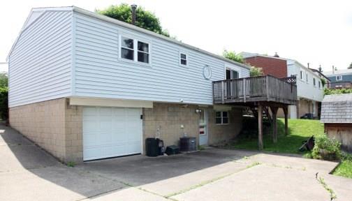 3056 Mt Troy Road Pittsburgh, PA 15212 - Photo 5 of 21 Back of the house, showing large deck, cement driveway