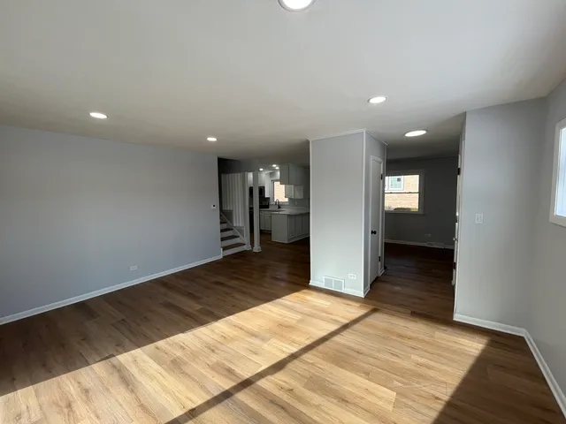 a view of an empty room and a gallery