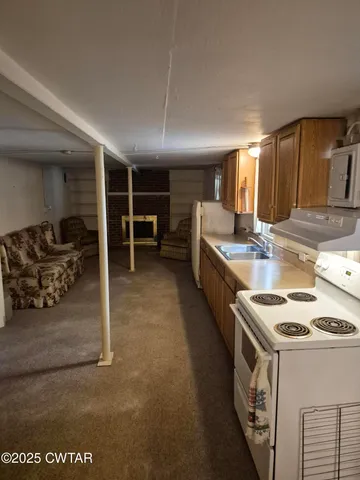 a kitchen that has a stove and a oven