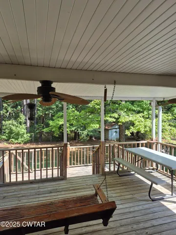 a balcony view with a seating space