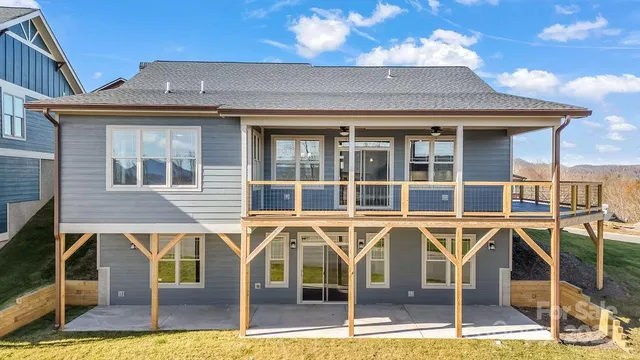 a front view of a house with glass windows