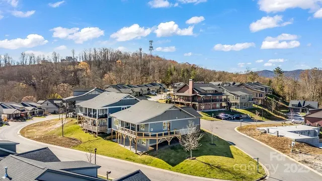 a view of a city with lawn chairs