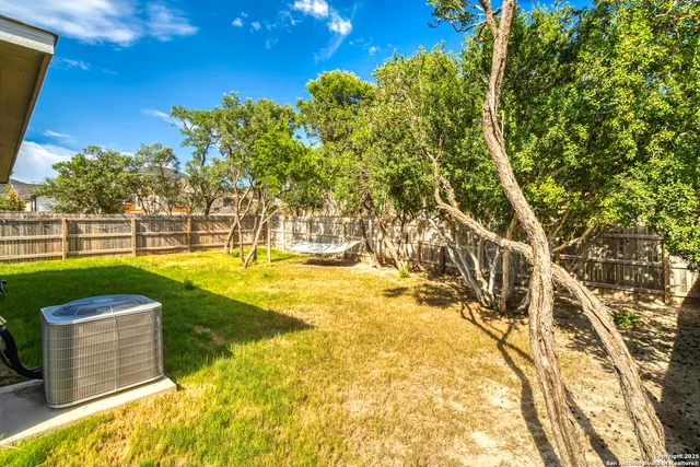 a view of a swimming pool with an outdoor space and seating area