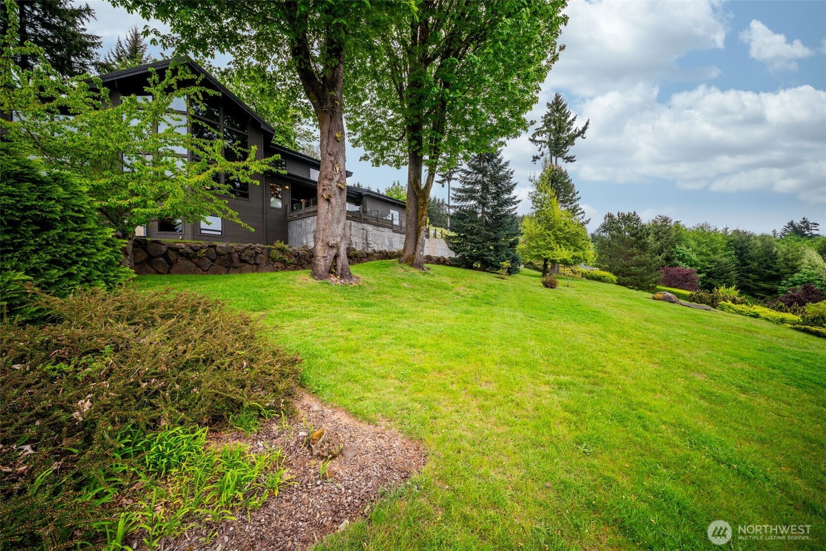 813 Varsity Road Kalama, WA 98625 - Photo 35 of 40 a view of a trees with a yard