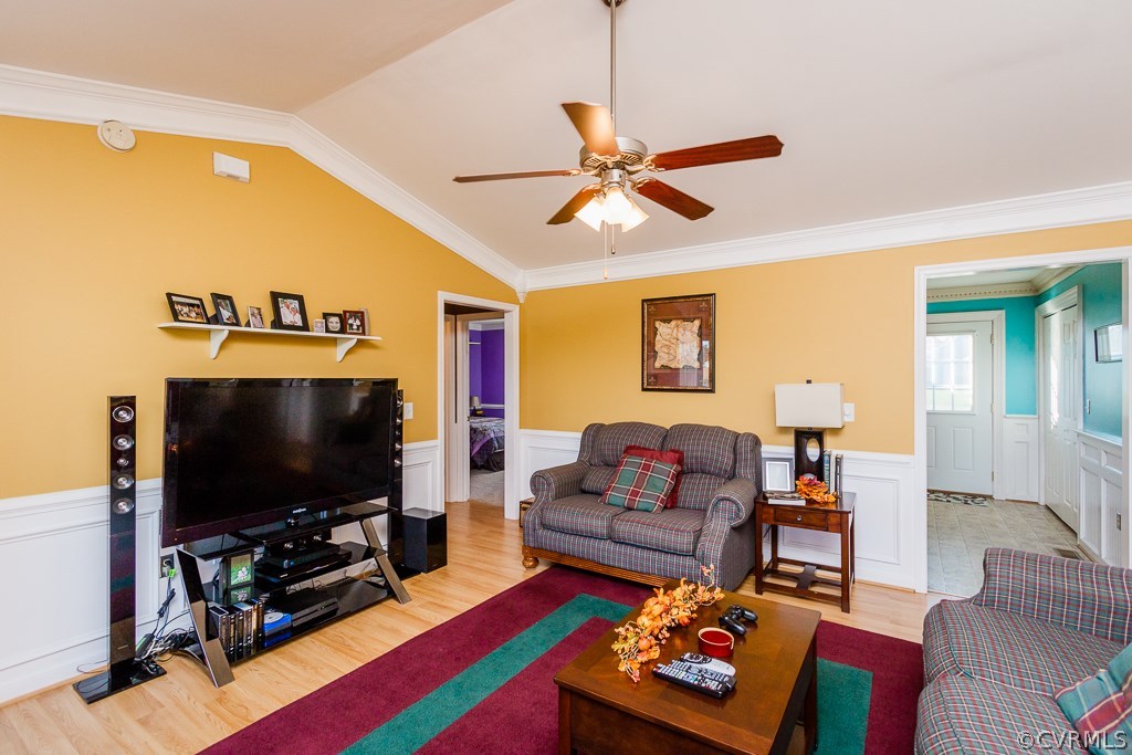 8398 Rowanty Road Carson, VA 23830 - Photo 3 of 34 a living room with furniture and a flat screen tv