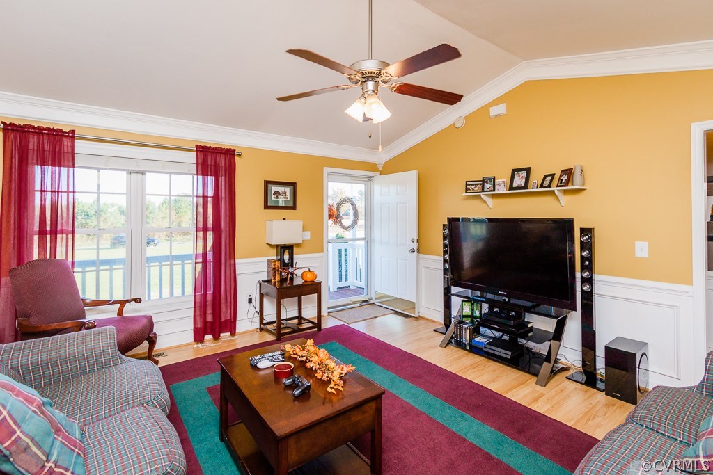 8398 Rowanty Road Carson, VA 23830 - Photo 4 of 34 a living room with furniture and a flat screen tv