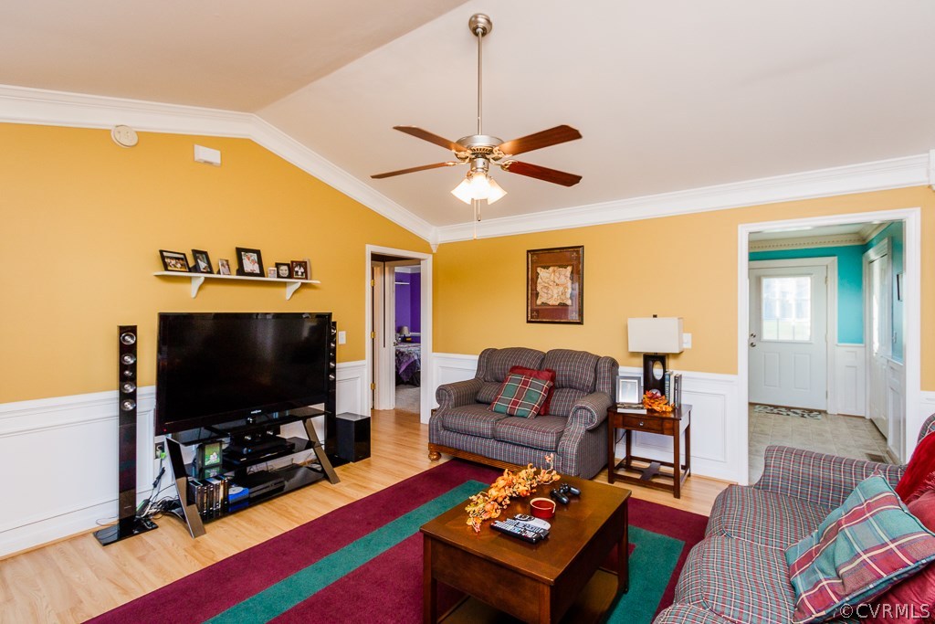 8398 Rowanty Road Carson, VA 23830 - Photo 6 of 34 a living room with furniture and a flat screen tv