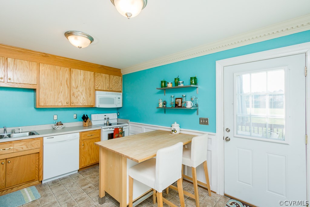 8398 Rowanty Road Carson, VA 23830 - Photo 7 of 34 a kitchen that has a sink and a stove in it