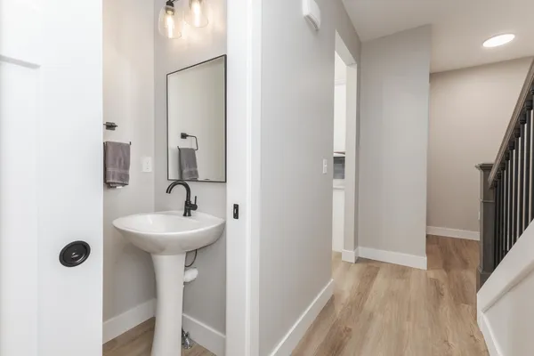 a terrace of a house with outdoor seating and ocean view