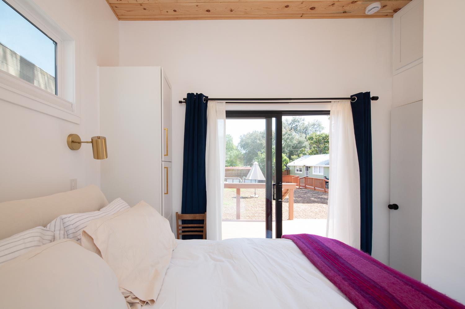 207 North Montgomery Street Ojai, CA 93023 - Photo 8 of 11 a bedroom with a large bed and a large window