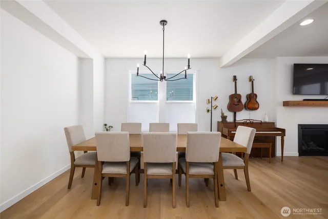 a living room with furniture fireplace and flat screen tv
