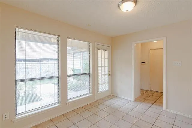 a view of an empty room with window