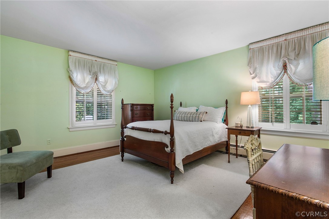 8015 Thom Road Henrico, VA 23229 - Photo 22 of 50 a bedroom with a bed chair and window