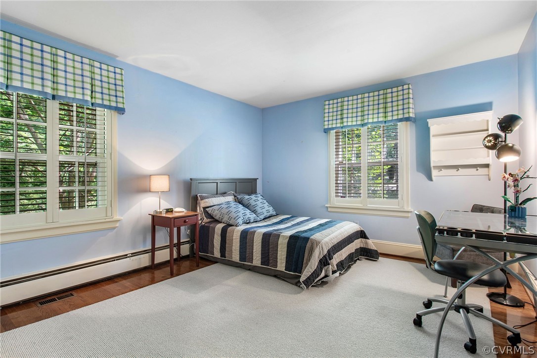 8015 Thom Road Henrico, VA 23229 - Photo 25 of 50 a room with a bed and a desk