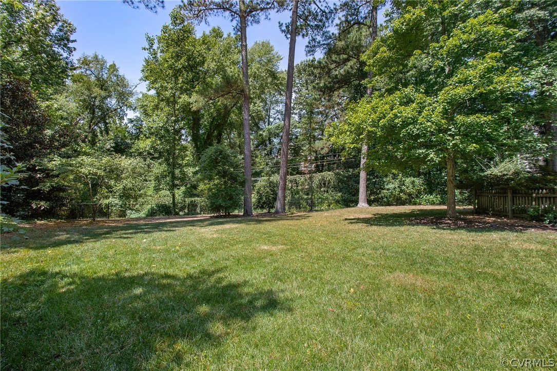 8015 Thom Road Henrico, VA 23229 - Photo 40 of 50 a view of a large yard with lots of green space