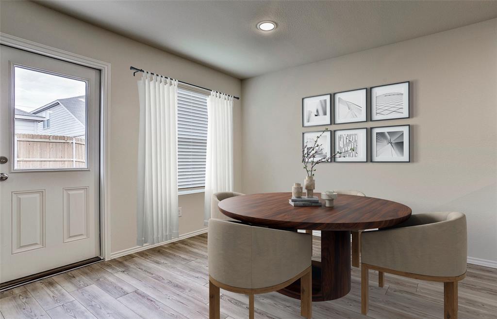 14057 Ladbroke Street Pilot Point, TX 76258 - Photo 5 of 11 a dining room with furniture and window