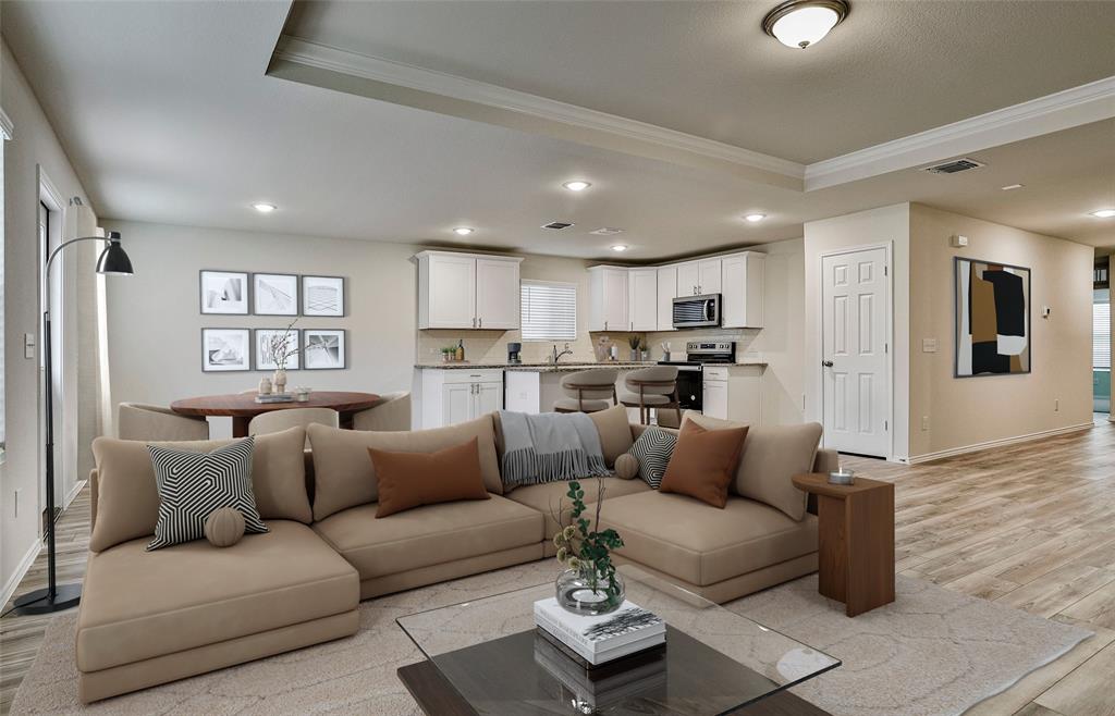 14057 Ladbroke Street Pilot Point, TX 76258 - Photo 6 of 11 a living room kitchen with furniture and a large window