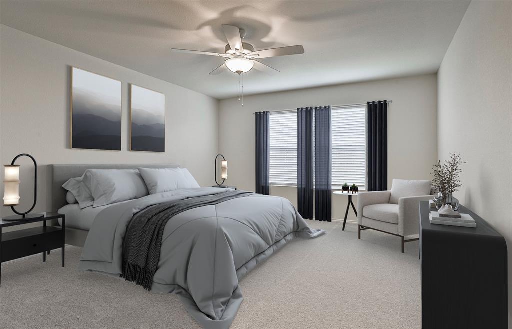 14057 Ladbroke Street Pilot Point, TX 76258 - Photo 9 of 11 a spacious bedroom with a bed and ceiling fan