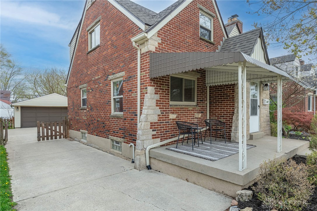 1012 Hampshire Road Dayton, OH 45419 - Photo 3 of 39 This classic brick residence features an inviting front porch and a convenient detached garage.