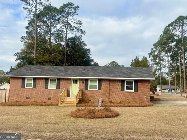 front view of a house with a patio