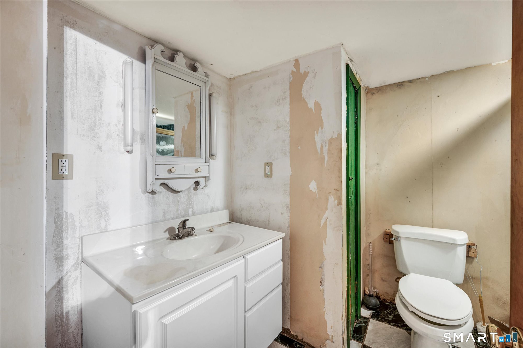 740 Rainbow Road Windsor, CT 06095 - Photo 36 of 40 a bathroom with a sink toilet and shower