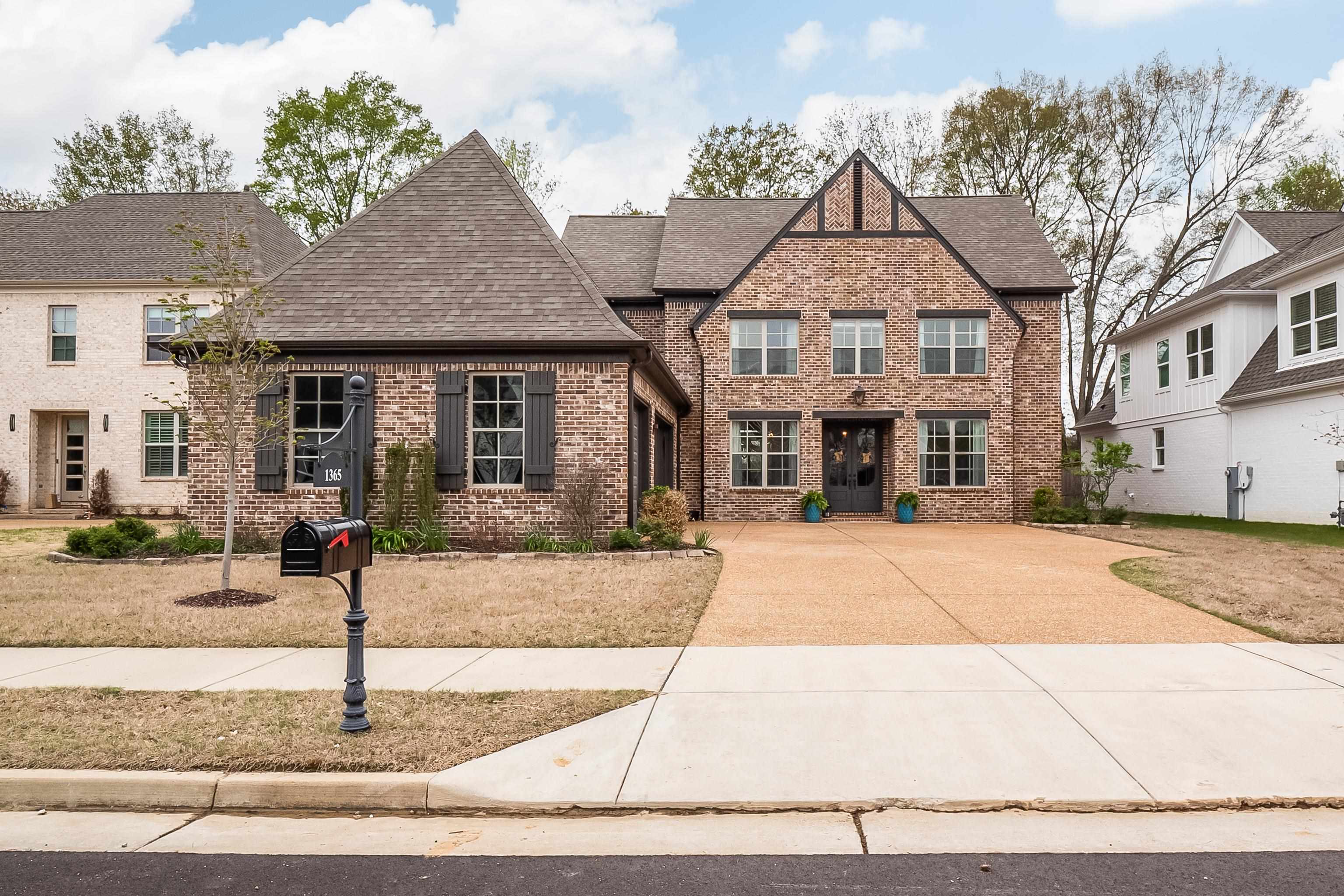 a front view of house with yard